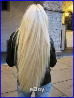 Full white platinum blonde straight hair. Lace front wig. Human Hair Blend
