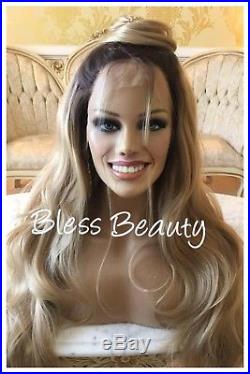 Layered ash blonde wavy lace front wig. Human Hair Blend. Brown Root